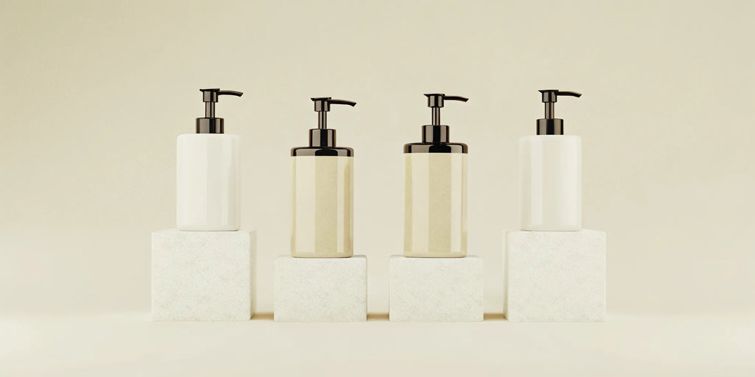 A modern, minimalist bathroom soap set with neutral-colored pump bottles.