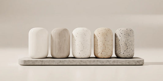 Artisanal premium California soap bars in neutral tones on a stone tray.