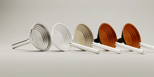 A variety of metal and plastic funnels for spill-proof liquid refills.