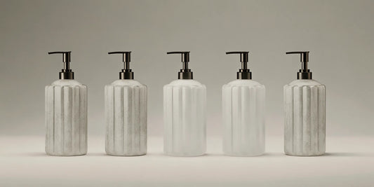 A collection of the five best soap bottle dispensers for a stylish sink.