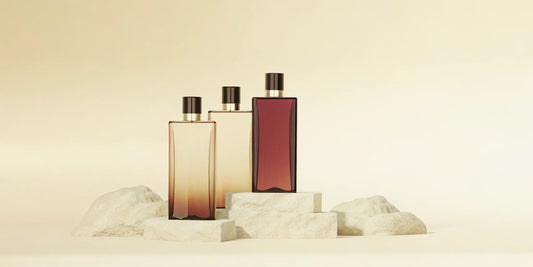Three perfume bottles on stone blocks, popular and long-lasting Jo Malone Wood Sage alternatives.