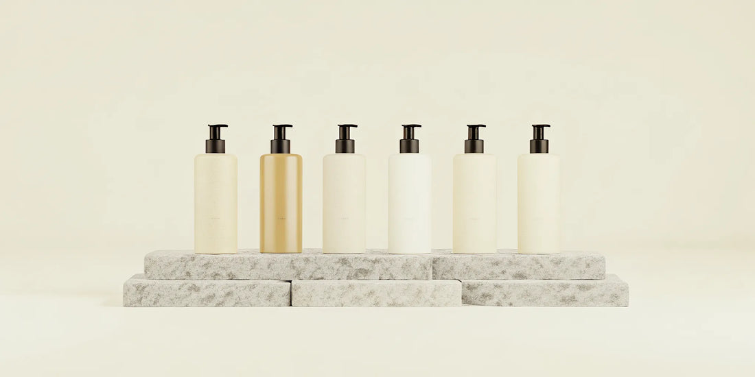A minimalist lineup of body wash bottles that smell expensive.