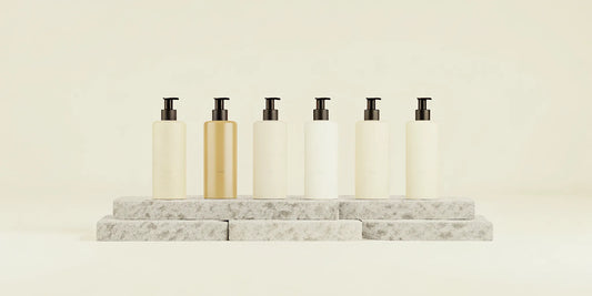A minimalist lineup of body wash bottles that smell expensive.