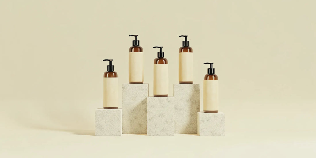 Minimalist hand wash bottles on stone blocks, similar to Aesop.