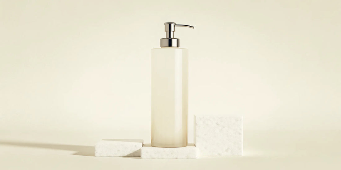 A sleek lotion dispenser bottle with a durable pump, a key feature in choosing the perfect bottle.
