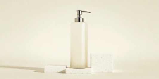 A sleek lotion dispenser bottle with a durable pump, a key feature in choosing the perfect bottle.