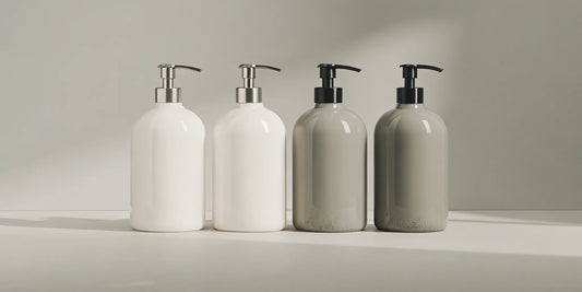 A selection of minimalist body wash dispenser bottles with pumps.
