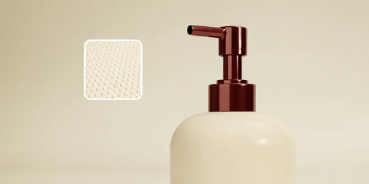 A durable metal replacement pump on a soap dispenser bottle.