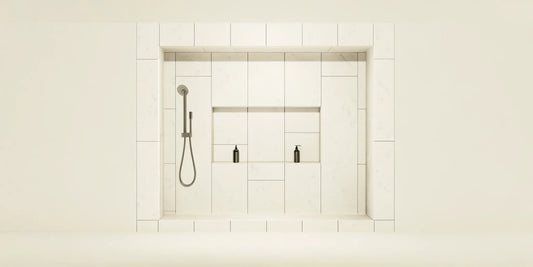 A pair of black soap dispensers for the shower in a tidy, minimalist bathroom.