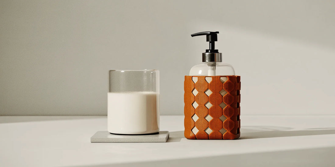 A restaurant's refill soap dispenser with a large container of liquid soap.