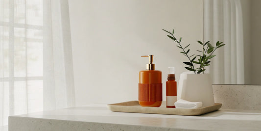 A hotel hand soap dispenser with a bottle of eco-friendly hand soap refills.
