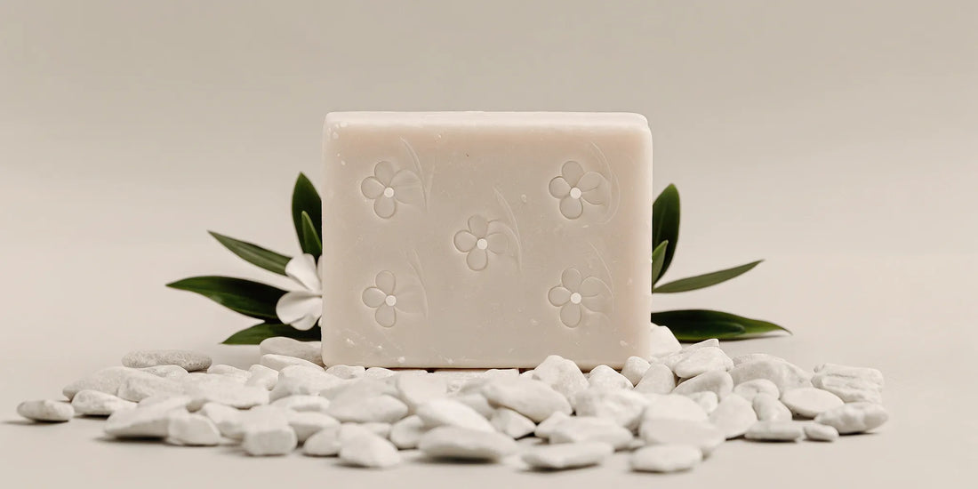 A gentle bar of soap with a floral design, a safe option for sensitive skin.