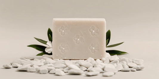 A gentle bar of soap with a floral design, a safe option for sensitive skin.