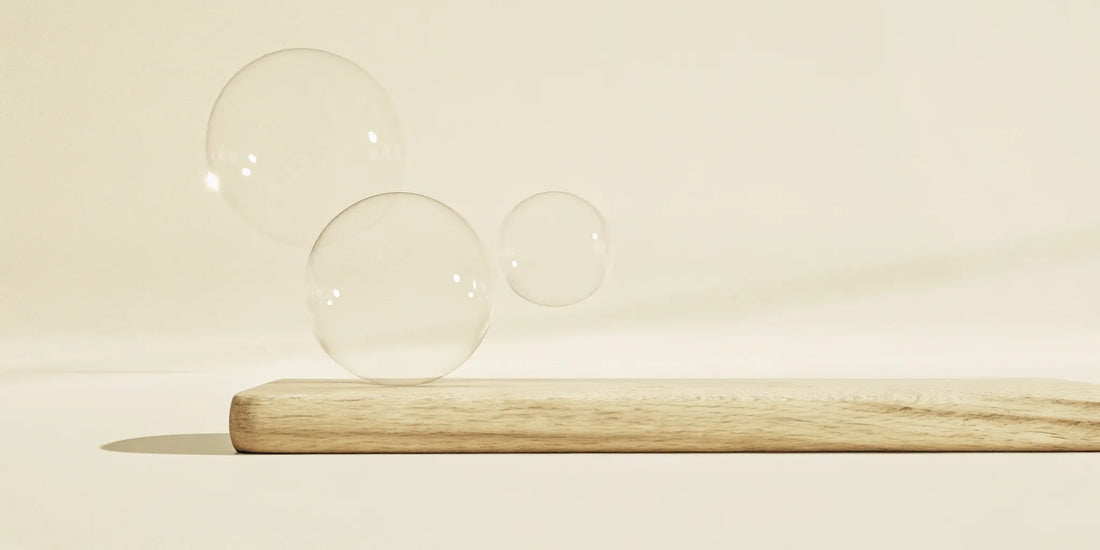 Sandalwood hand soap refill with rich, cleansing lather on a wooden tray.