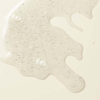 Close up of AEP Scent Terra hand soap texture showing an exfoliating hand soap on a beige background, highlighting the product's natural and sophisticated formula.   
