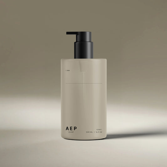 AEP Scent reusable, transluscent soap dispenser bottle in matte beige with black pump, minimalist design for premium refill use, photographed on a neutral background.